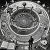 Surreal Black and White Cyberpunk looking at Celestial Zodiac Map with Clock Planets