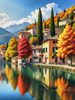 Printable art of an Italian village by a lake with autumn leaves reflection