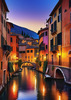 Twilight over Italian River Town with Lanterns and Fall Colors Art Print