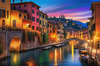 Twilight over Italian River Town with Lanterns and Fall Colors Art Print