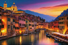 Twilight over Italian River Town with Lanterns and Fall Colors Art Print
