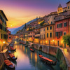 Twilight over Italian River Town with Lanterns and Fall Colors Art Print